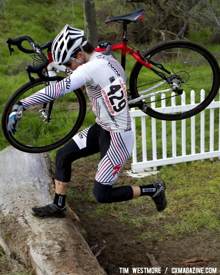 The massive log forced most riders off their bikes before a run-up. Socal vs. Norcal Cyclocross Championships. © Tim Westmore